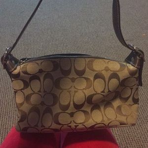 Brown monogrammed coach bag